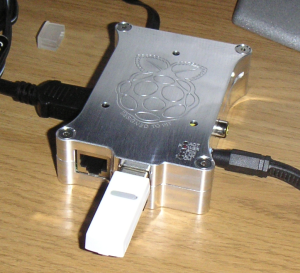 My Raspberry Pi in its Pi Holder aluminum case, and some dust.